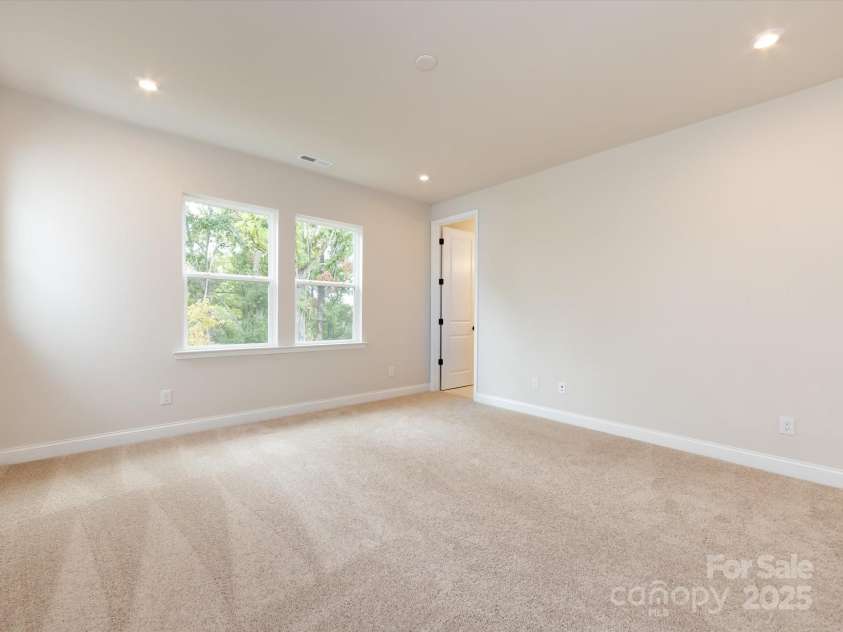 7944 Cedarsmith Court, Charlotte, NC 28217.  MLS# CAR4215191, YatesRealty ID 24064. Primary Suite Bathed in Natural Light.