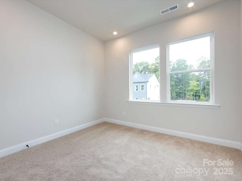 7944 Cedarsmith Court, Charlotte, NC 28217.  MLS# CAR4215191, YatesRealty ID 24064. Secondary Bedroom.
