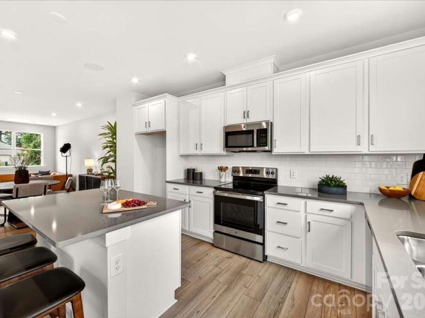 4032 Canvas Court, Charlotte, NC 28205.  MLS# CAR4384752, YatesRealty ID 24070. Electric range, Microwave and dishwasher 