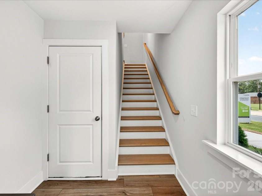 4032 Canvas Court, Charlotte, NC 28205.  MLS# CAR4384752, YatesRealty ID 24070. First Floor Oak box stairs 