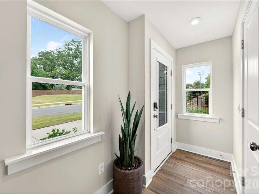4032 Canvas Court, Charlotte, NC 28205.  MLS# CAR4384752, YatesRealty ID 24070. Foyer with added end-unit windows