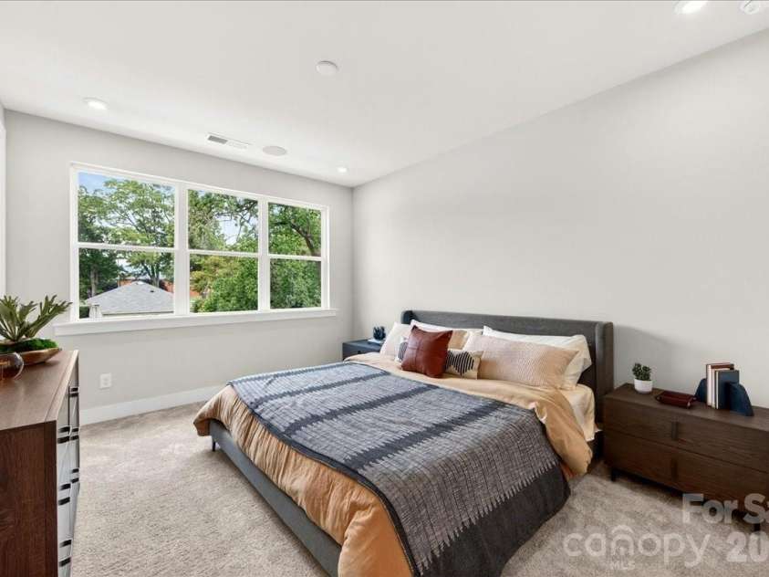 4032 Canvas Court, Charlotte, NC 28205.  MLS# CAR4384752, YatesRealty ID 24070. Primary Bedroom with large windows