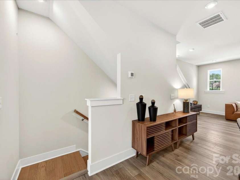 4032 Canvas Court, Charlotte, NC 28205.  MLS# CAR4384752, YatesRealty ID 24070. Second floor landing 