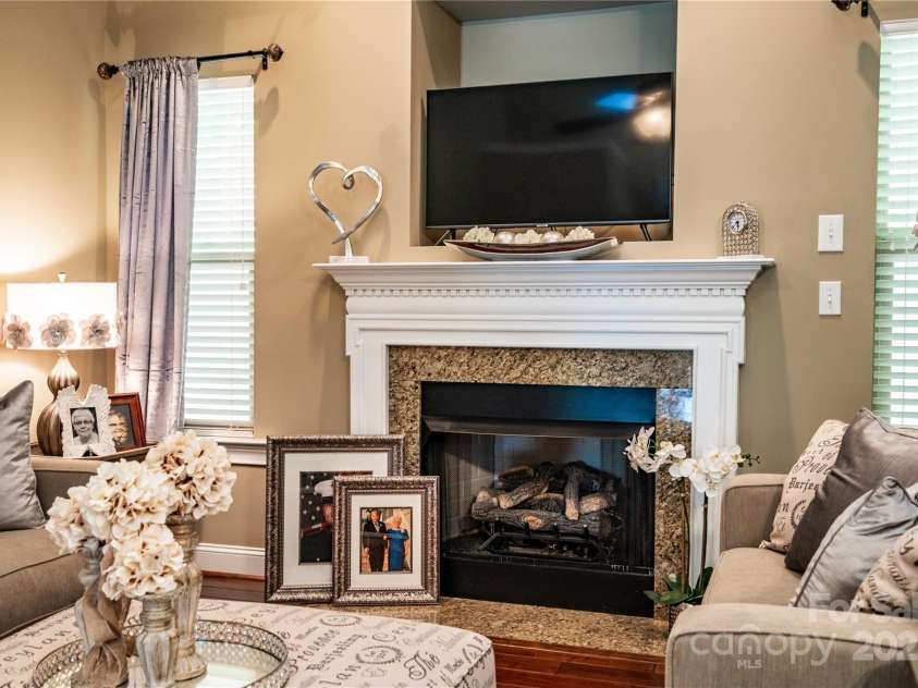 128 Aztec Circle, Mooresville, NC 28117.  MLS# CAR4267164, YatesRealty ID 24072. Cozy fireplace for chilly nights