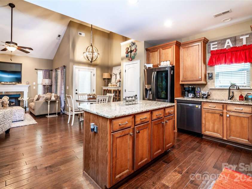 128 Aztec Circle, Mooresville, NC 28117.  MLS# CAR4267164, YatesRealty ID 24072. Kitchen featuring beautiful cabinets, island and pantry