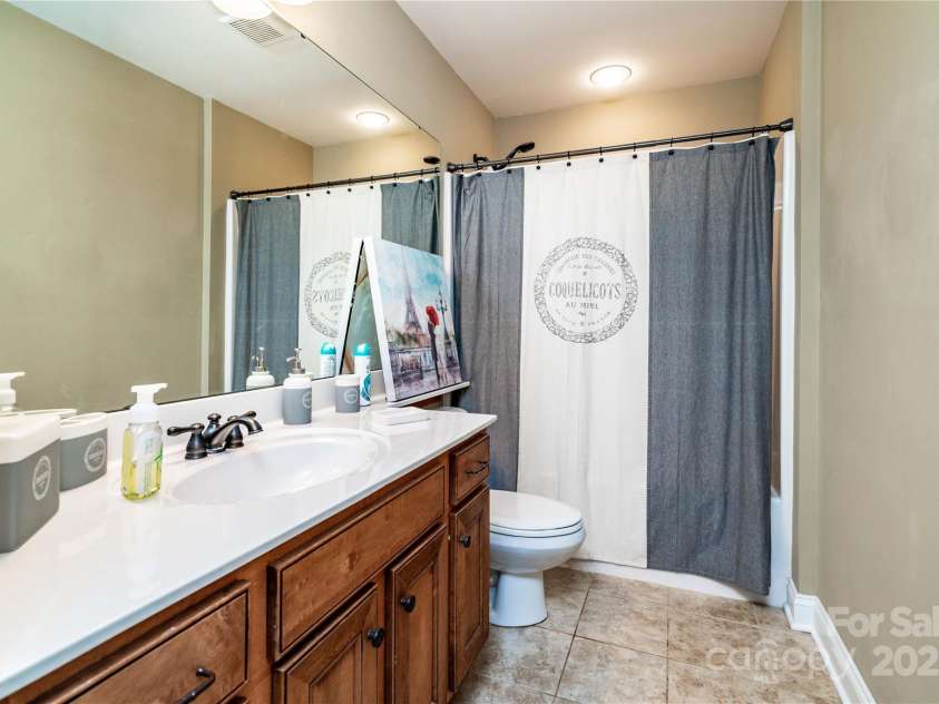 128 Aztec Circle, Mooresville, NC 28117.  MLS# CAR4267164, YatesRealty ID 24072. Secondary bathroom upstairs