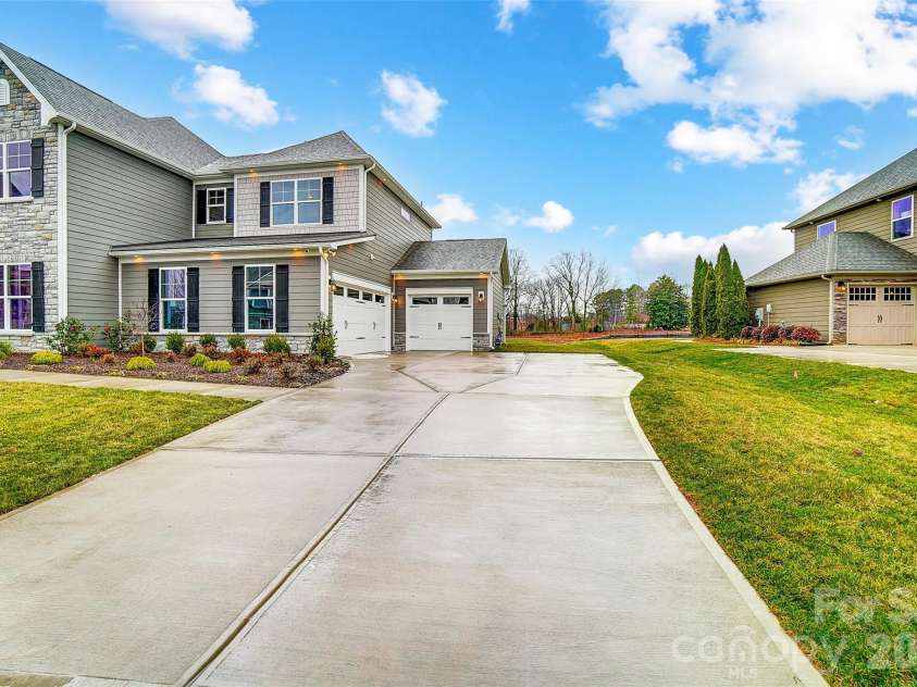 1311 Wiggins Drive, Gastonia, NC 28054.  MLS# CAR4384773, YatesRealty ID 24075. Side load and utility garage