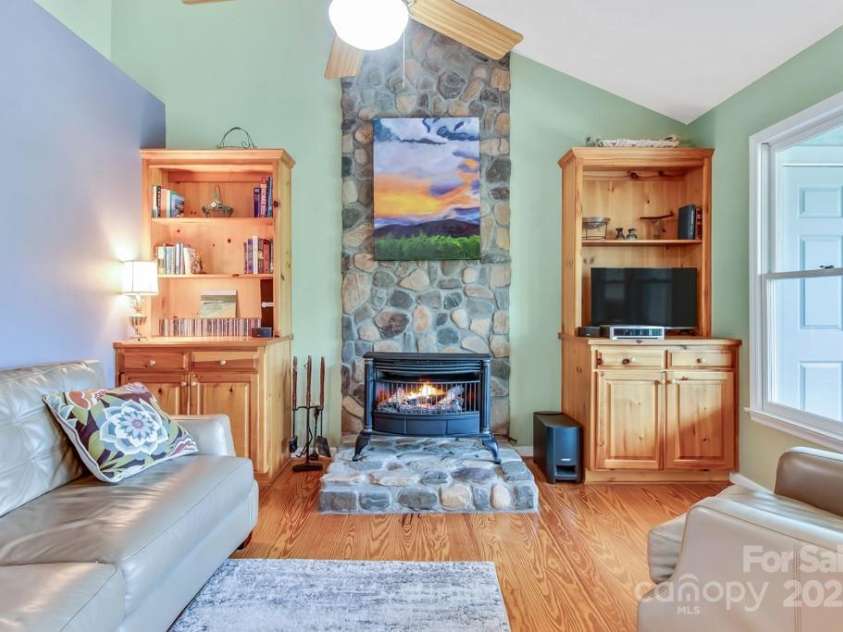 16 Oakview Lane, Saluda, NC 28773.  MLS# CAR4249530, YatesRealty ID 24075. Great-room with vaulted ceiling