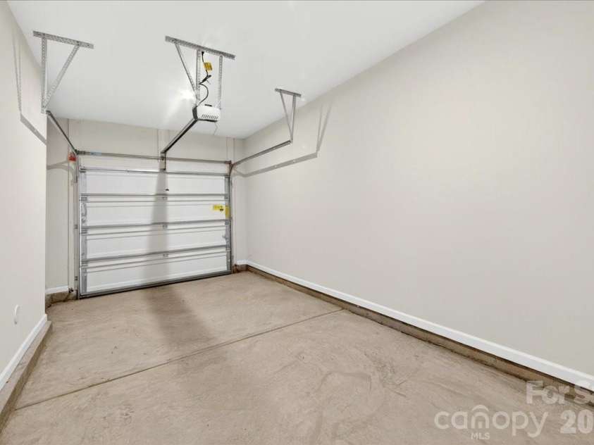 6049 Longar Lane, Charlotte, NC 28269.  MLS# CAR4384836, YatesRealty ID 24079. 1 bay front load garage