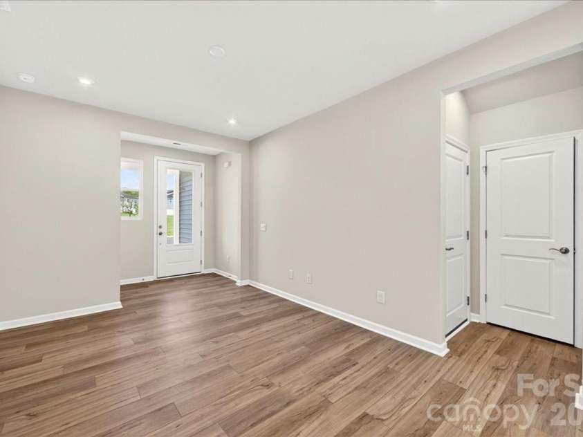 6049 Longar Lane, Charlotte, NC 28269.  MLS# CAR4384836, YatesRealty ID 24079. Coat closet and garage access