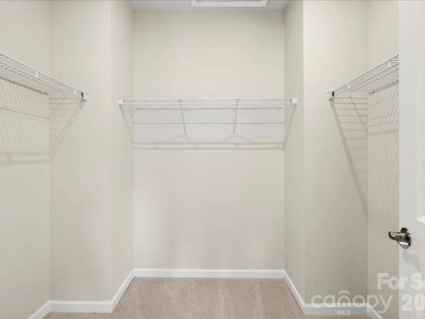 6049 Longar Lane, Charlotte, NC 28269.  MLS# CAR4384836, YatesRealty ID 24079. Large primary walk-in closet 