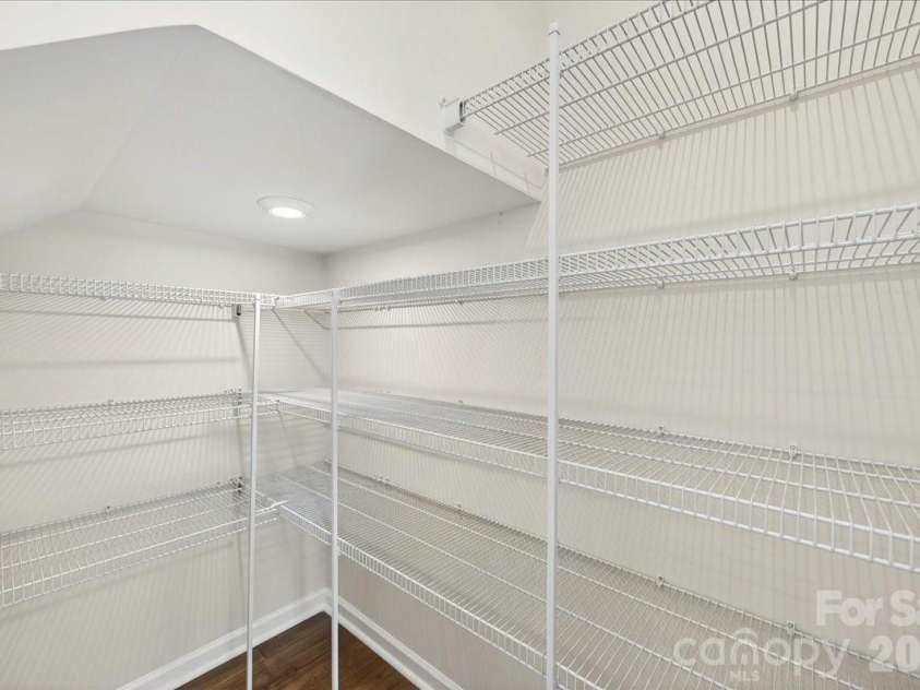6049 Longar Lane, Charlotte, NC 28269.  MLS# CAR4384836, YatesRealty ID 24079. Large walk-in closet 