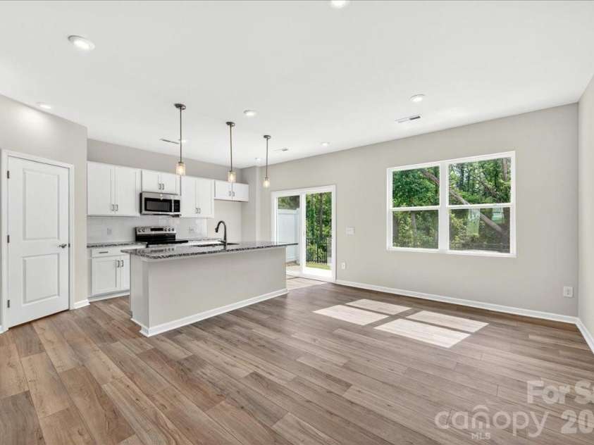 6049 Longar Lane, Charlotte, NC 28269.  MLS# CAR4384836, YatesRealty ID 24079. Open concept living