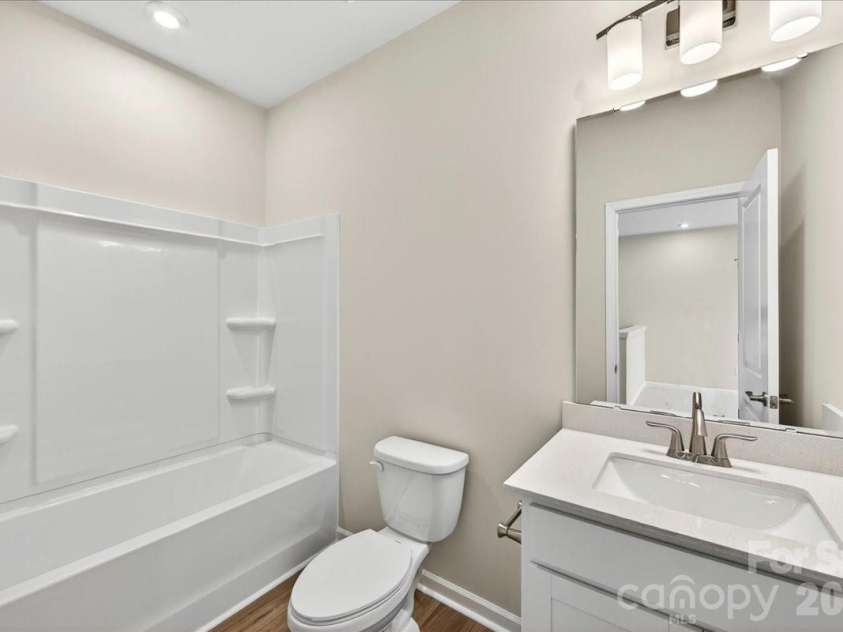 6049 Longar Lane, Charlotte, NC 28269.  MLS# CAR4384836, YatesRealty ID 24079. Secondary Bathroom