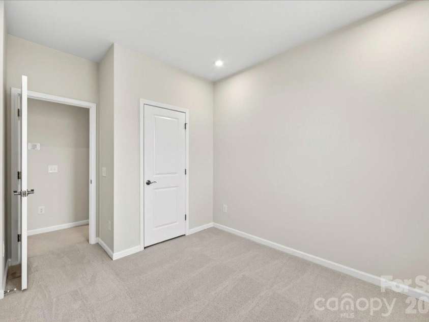 6049 Longar Lane, Charlotte, NC 28269.  MLS# CAR4384836, YatesRealty ID 24079. Secondary bedroom