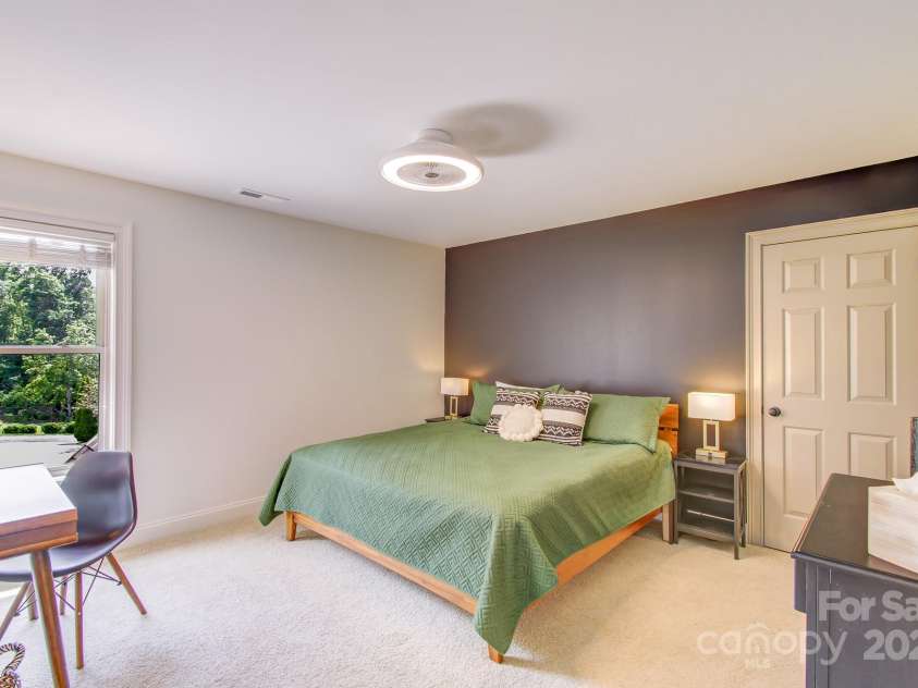 54 Mcintyre Drive, Asheville, NC 28803.  MLS# CAR4272814, YatesRealty ID 24082. Upstairs bedroom with large closet and storage