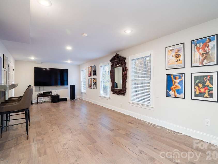 1617 Home Place, Matthews, NC 28105.  MLS# CAR4384540, YatesRealty ID 24083. Basement Rec Area