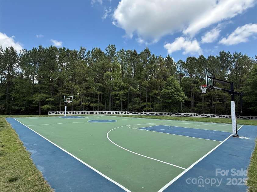 7319 Stonehaven Drive, Waxhaw, NC 28173.  MLS# CAR4266937, YatesRealty ID 24083. Full basketball court!