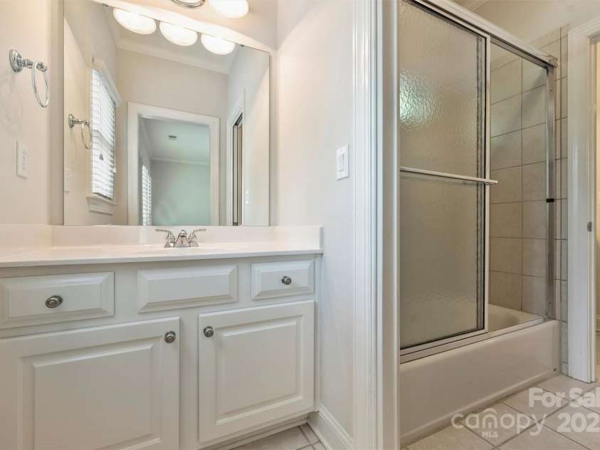 7319 Stonehaven Drive, Waxhaw, NC 28173.  MLS# CAR4266937, YatesRealty ID 24083. One side of the Jack and Jill bathroom that connects bedrooms 2 and 3.