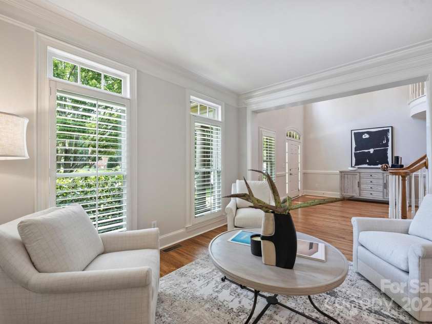 7319 Stonehaven Drive, Waxhaw, NC 28173.  MLS# CAR4266937, YatesRealty ID 24083. Plantation shutters grace the front and side windows of the home.