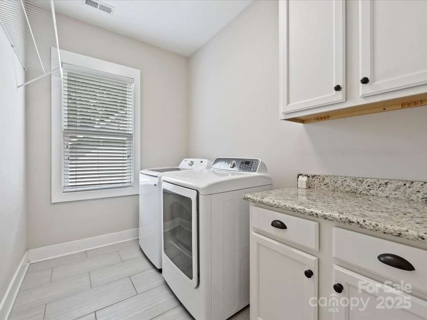 615 Welker Street, Charlotte, NC 28204.  MLS# CAR4293298, YatesRealty ID 24084. Laundry Room