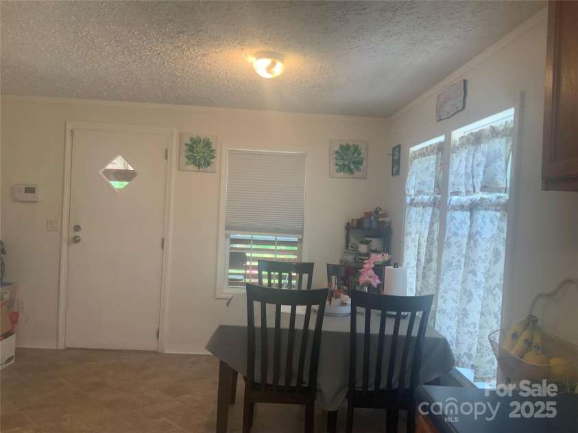 201 Spring Place Drive, Hendersonville, NC 28791.  MLS# CAR4276273, YatesRealty ID 24086. 