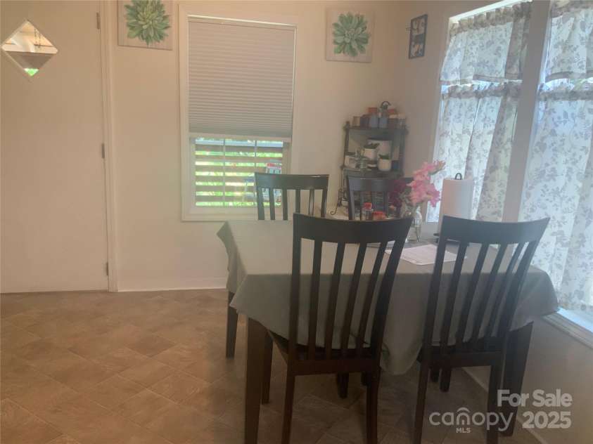 201 Spring Place Drive, Hendersonville, NC 28791.  MLS# CAR4276273, YatesRealty ID 24086. 