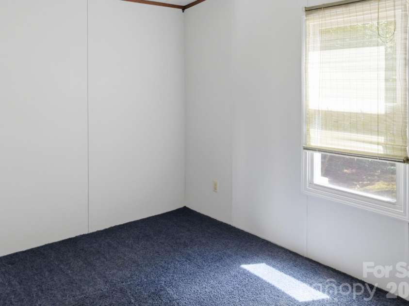 25 Glenn Lance Lane, Fairview, NC 28730.  MLS# CAR4384407, YatesRealty ID 24086. Bedroom