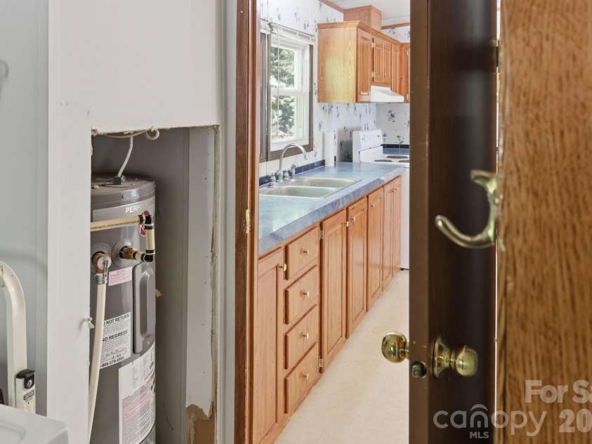 25 Glenn Lance Lane, Fairview, NC 28730.  MLS# CAR4384407, YatesRealty ID 24086. View from Utility Room
