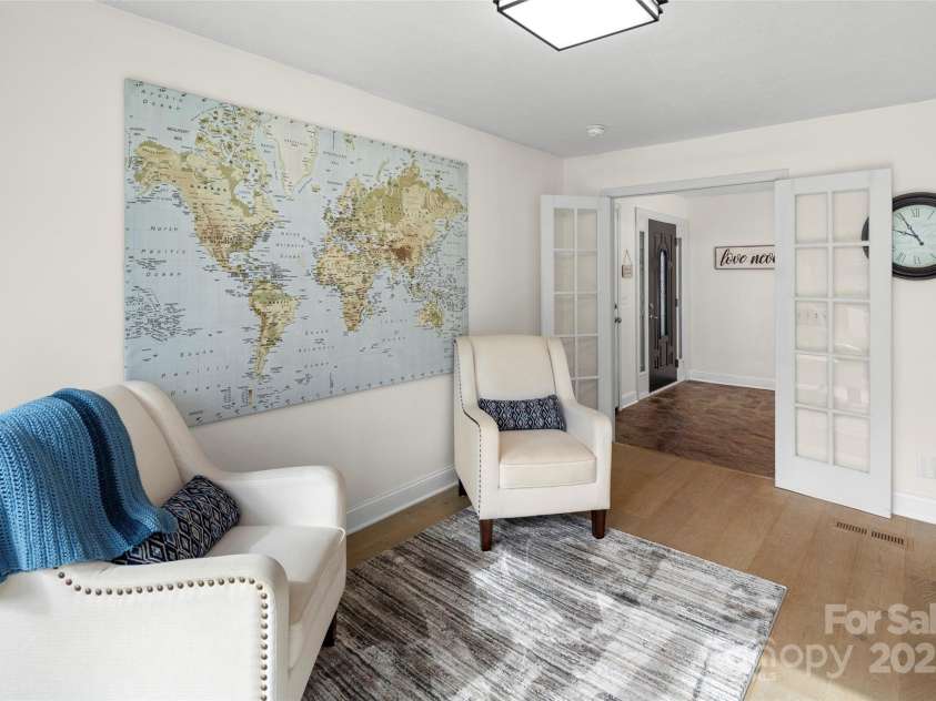 4075 Little River Road, Hendersonville, NC 28739.  MLS# CAR4243668, YatesRealty ID 24087. Delightful sitting area off of foyer (or ideal spot for sunny breakfast nook)