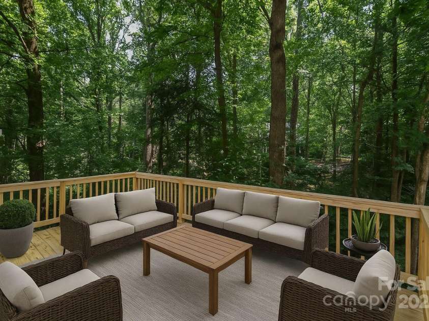 8510 Glade Court, Huntersville, NC 28078.  MLS# CAR4275837, YatesRealty ID 24089. Relax in comfort on your brand new elevated deck.
