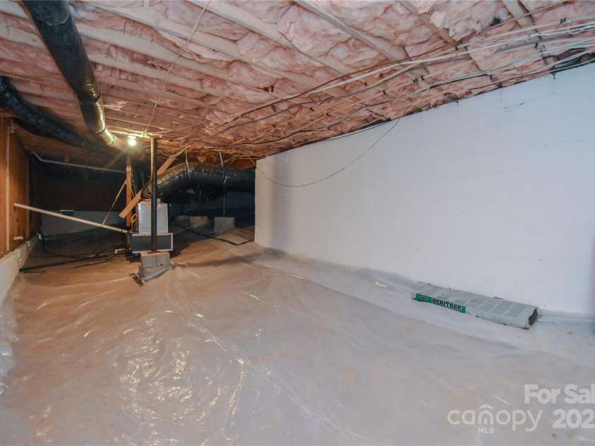 8510 Glade Court, Huntersville, NC 28078.  MLS# CAR4275837, YatesRealty ID 24089. Unfinished basement / storage area. Tons of potential.
