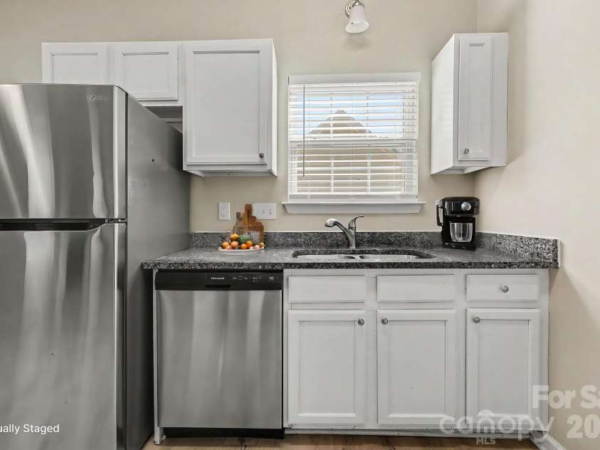 5463 Realtree Lane, Charlotte, NC 28214.  MLS# CAR4382954, YatesRealty ID 24090. Virtually Staged