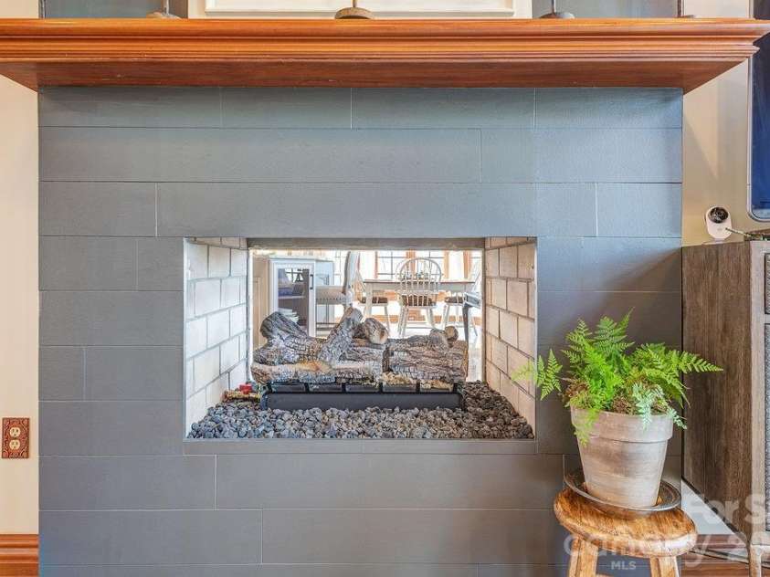 76 Bradford Vistas Drive, Fletcher, NC 28732.  MLS# CAR4335092, YatesRealty ID 2410. 2 Sided Fireplace (livinroom side)