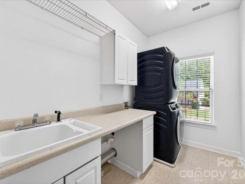 428 Ranelagh Drive, Waxhaw, NC 28173.  MLS# CAR4370707, YatesRealty ID 24103. Spacious laundry (W/D included)