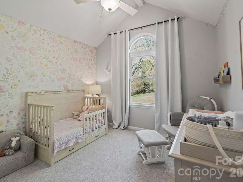 110 Steuben Drive, Huntersville, NC 28078.  MLS# CAR4362724, YatesRealty ID 24105. 2nd bedroom with vaulted ceilings