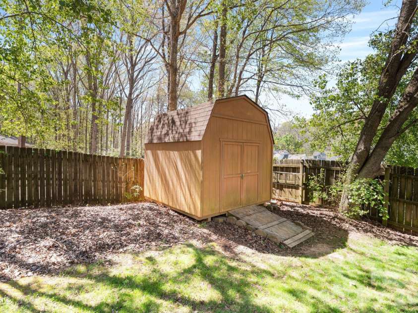 110 Steuben Drive, Huntersville, NC 28078.  MLS# CAR4362724, YatesRealty ID 24105. Storage building provides additional option for yard tools 