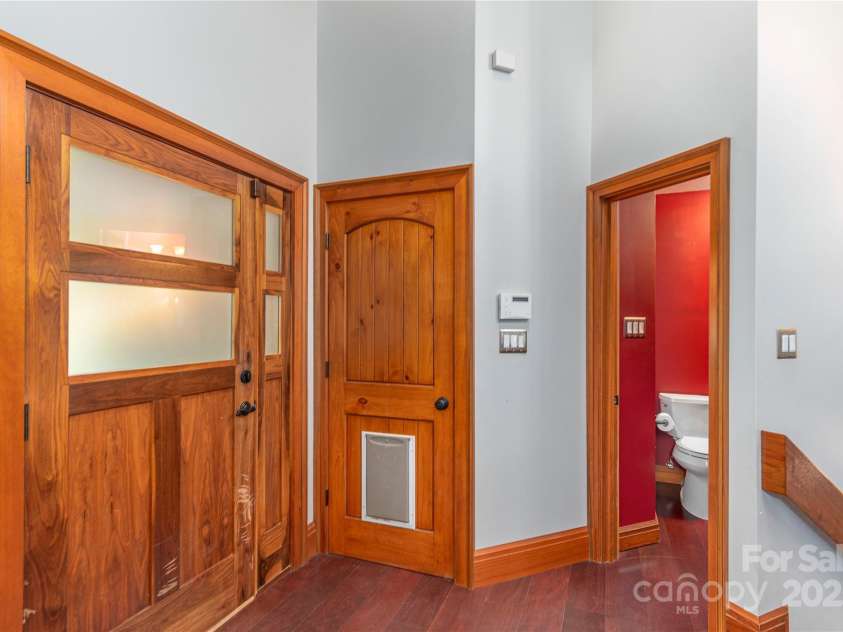 1227 Brush Creek Circle, Fairview, NC 28730.  MLS# CAR4265293, YatesRealty ID 24110. Entryway, garage access, 1/2 bath