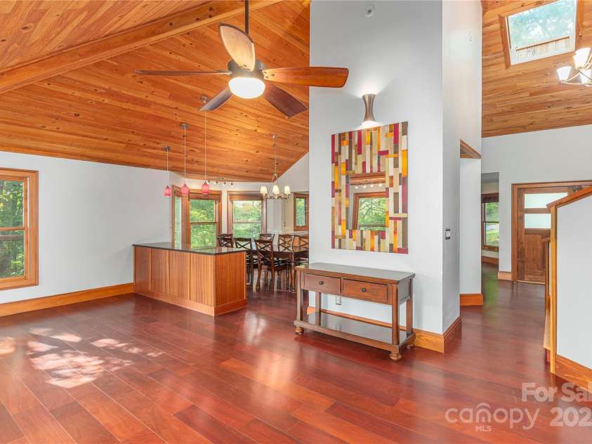 1227 Brush Creek Circle, Fairview, NC 28730.  MLS# CAR4265293, YatesRealty ID 24110. High vaulted wood ceilings and engineered Purple Heart floors