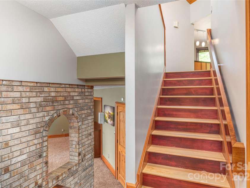 1227 Brush Creek Circle, Fairview, NC 28730.  MLS# CAR4265293, YatesRealty ID 24110. Steps to entertainment den!