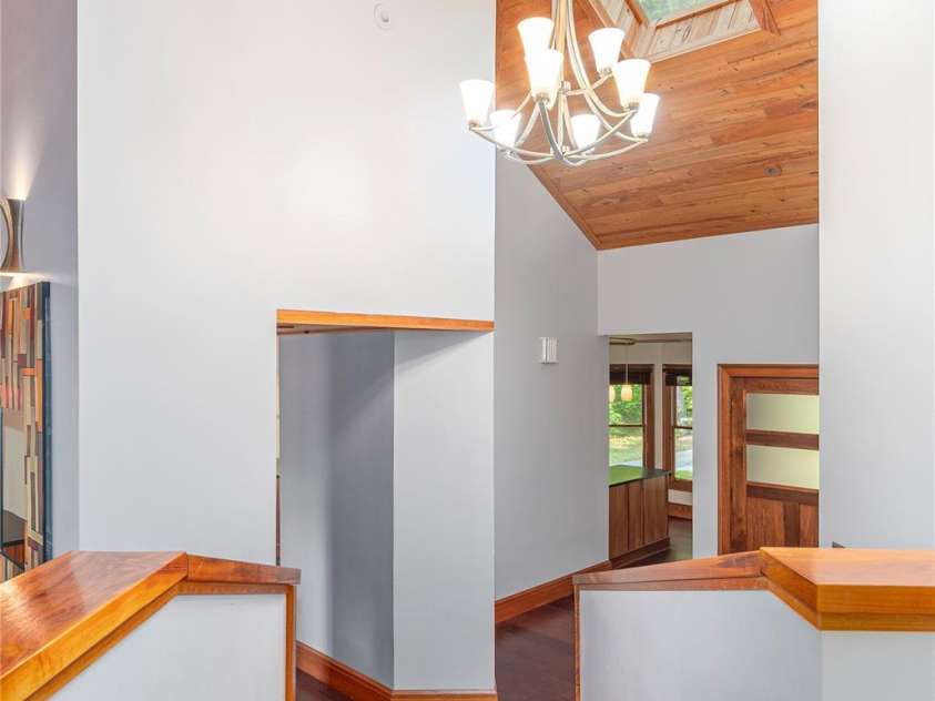 1227 Brush Creek Circle, Fairview, NC 28730.  MLS# CAR4265293, YatesRealty ID 24110. View into living space from primary suite
