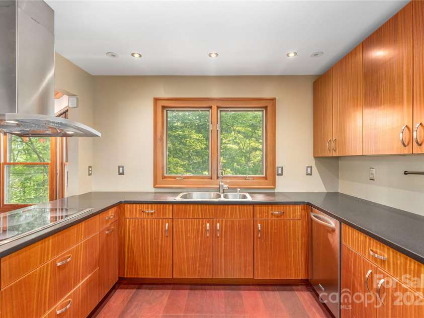 1227 Brush Creek Circle, Fairview, NC 28730.  MLS# CAR4265293, YatesRealty ID 24110. Views of green whilst chasing your culinary conquests!