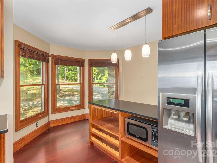 1227 Brush Creek Circle, Fairview, NC 28730.  MLS# CAR4265293, YatesRealty ID 24110. Wine storage area