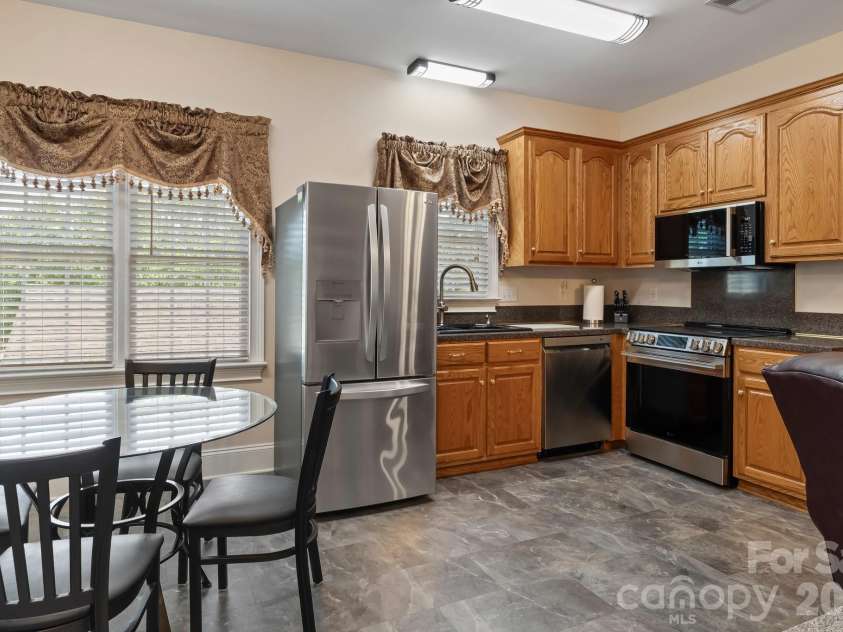 726 Tom Morris Lane, Concord, NC 28027.  MLS# CAR4382168, YatesRealty ID 24111. 2nd living quarters.