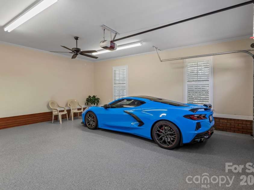 726 Tom Morris Lane, Concord, NC 28027.  MLS# CAR4382168, YatesRealty ID 24111. Attached 2 car side load garage.