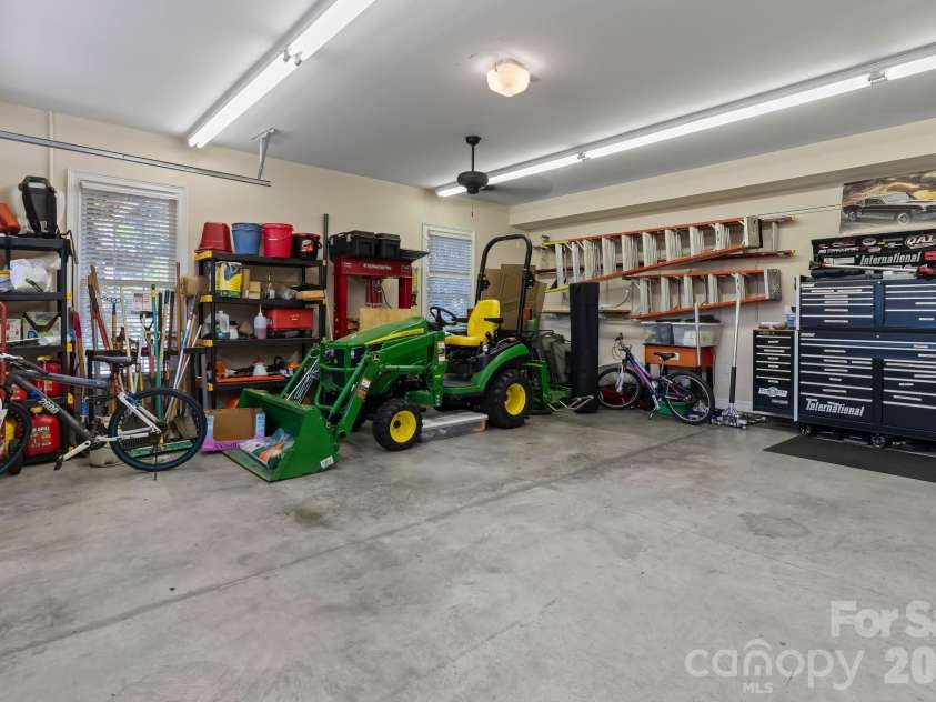 726 Tom Morris Lane, Concord, NC 28027.  MLS# CAR4382168, YatesRealty ID 24111. Detached 2 car garage.