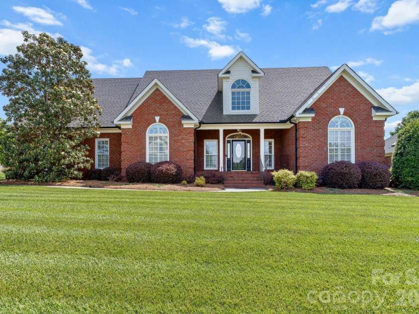 726 Tom Morris Lane, Concord, NC 28027.  MLS# CAR4382168, YatesRealty ID 24111. Front view.