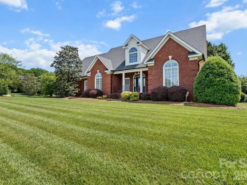 726 Tom Morris Lane, Concord, NC 28027.  MLS# CAR4382168, YatesRealty ID 24111. Front view.