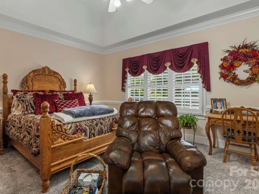 726 Tom Morris Lane, Concord, NC 28027.  MLS# CAR4382168, YatesRealty ID 24111. Main level primary bedroom.