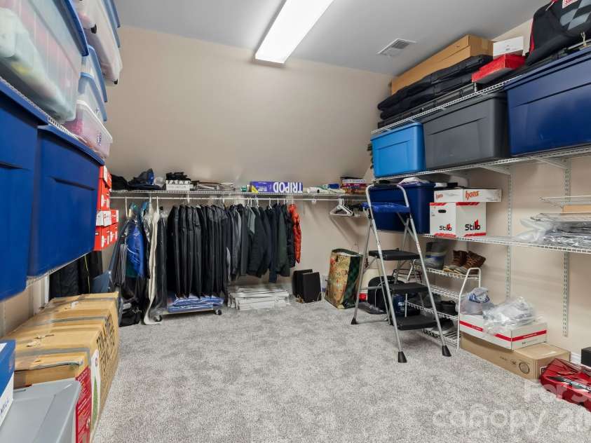 726 Tom Morris Lane, Concord, NC 28027.  MLS# CAR4382168, YatesRealty ID 24111. Upper storage room/closet.